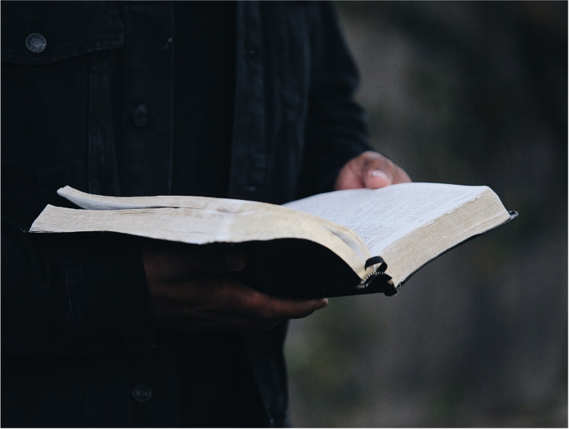 A man reading the Holy Bible